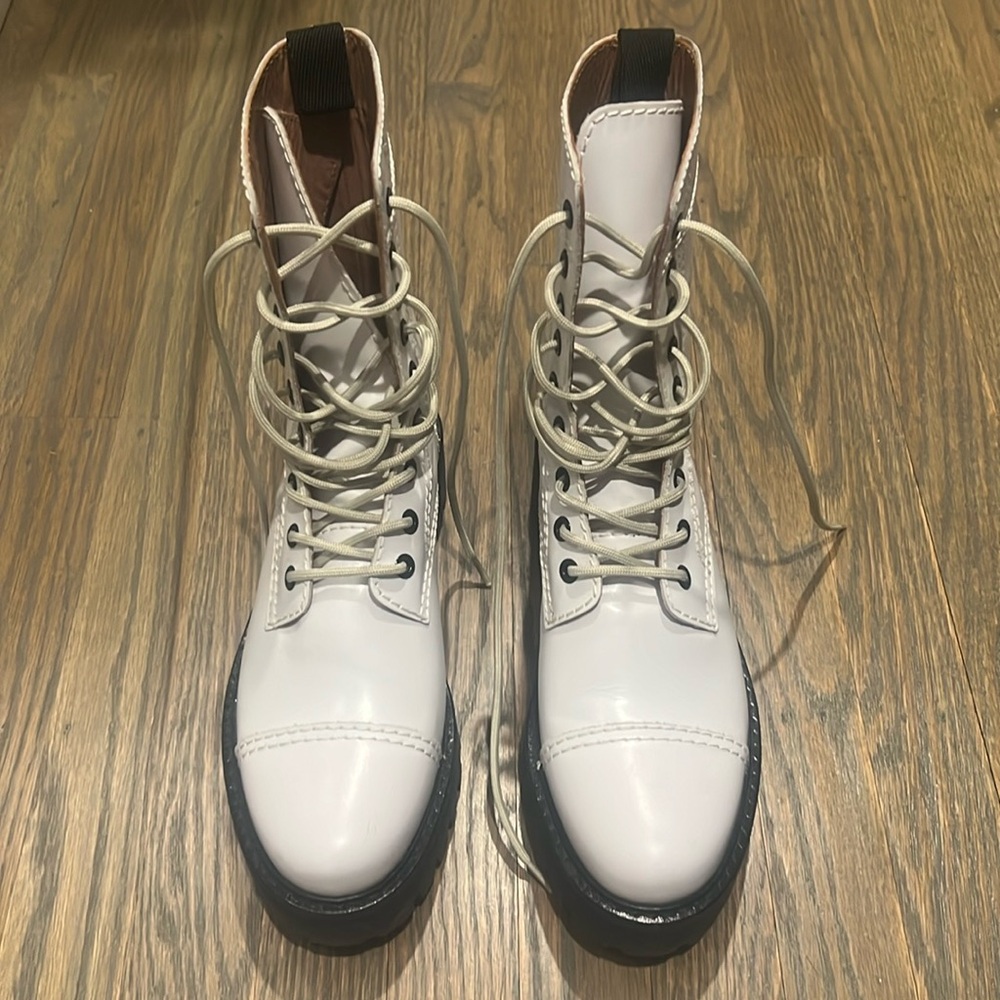 Alexa Chung lace up white military boots.
